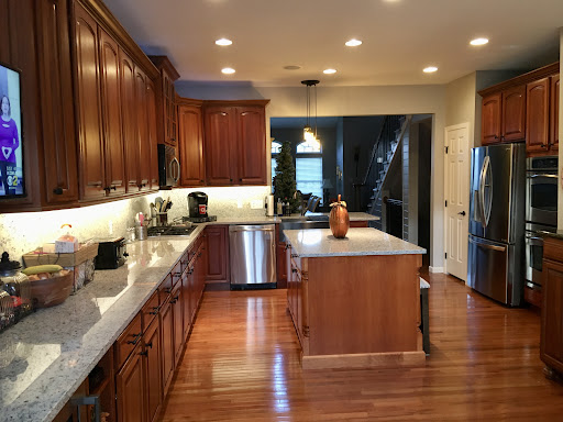 Traditional cherry cabinet kitchen with granite counters