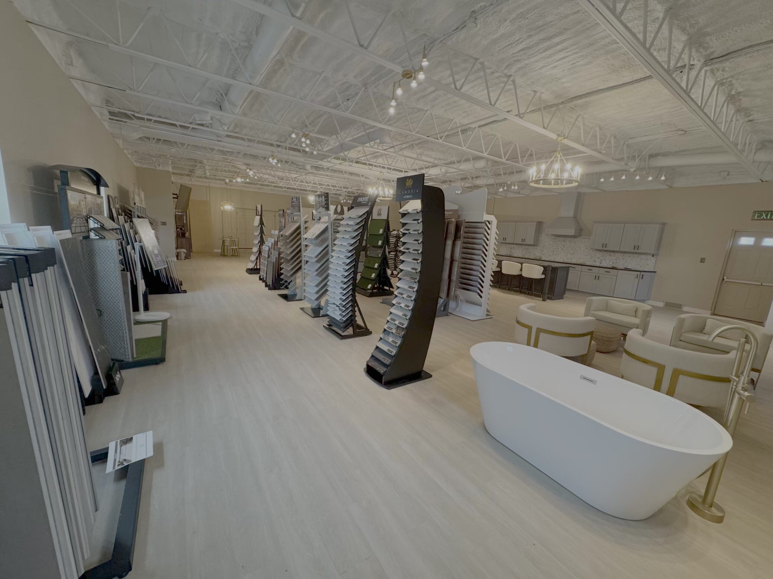 Steel Valley Showroom kitchen display with white cabinets and marble backsplash